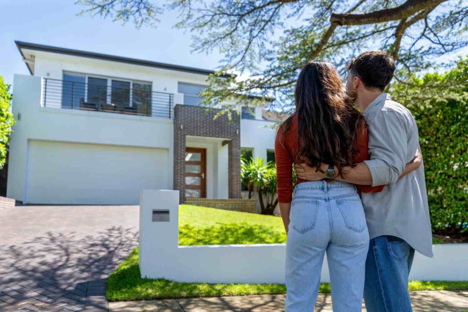People evaluating a residential property for real estate investment across the Bay Area